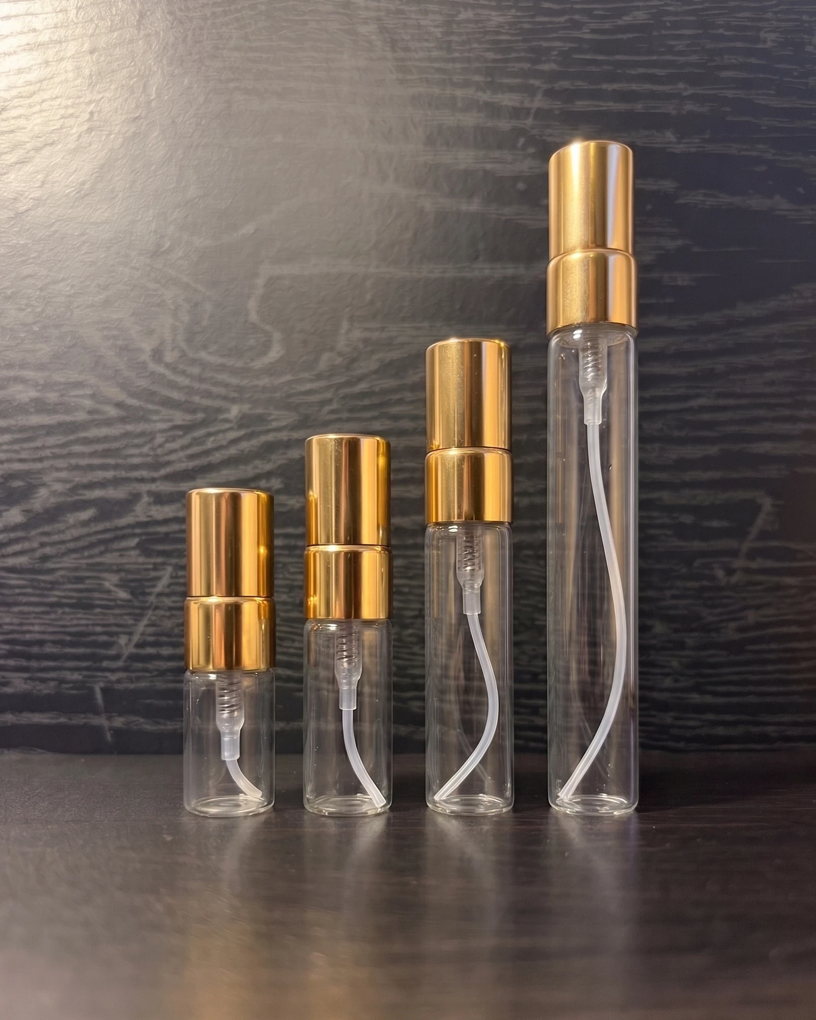 Los cuatro tamaños de decant, de 2 a 10 ml, comparados entre sí
